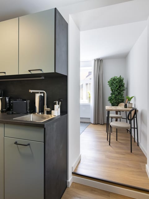 Suite | Private kitchen | Fridge, espresso maker, electric kettle, toaster