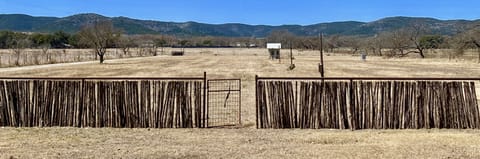 Away at the River - The large yard leads to the fields that are all fenced with spectacular views.