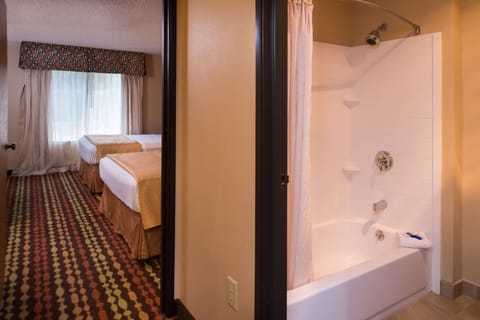 Suite, 2 Queen Beds, Non Smoking, Refrigerator (Oversized Room;Third bed is a Sofabed) | Bathroom | Combined shower/tub, free toiletries, hair dryer, towels