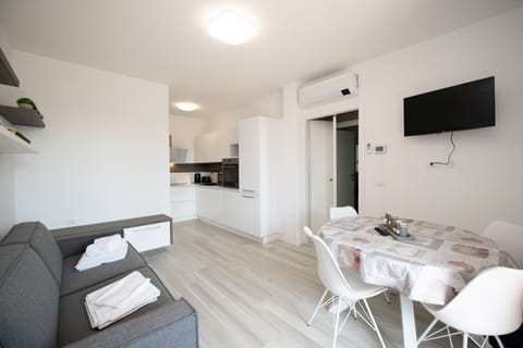 Exclusive Apartment | Living area | 90-inch Smart TV with digital channels, TV