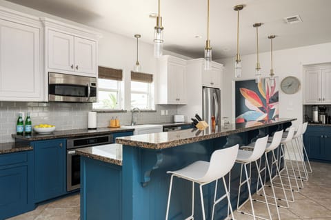 Large, open kitchen, plenty of countertop and work space, made for socializing