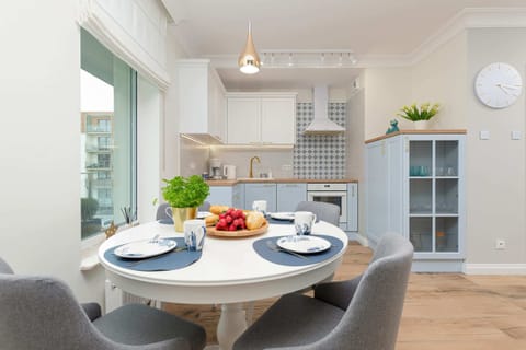 Table setting with fresh fruit and an inviting layout for meals.
