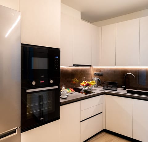 Luxury Suite, Kitchen | Private kitchen | Microwave, espresso maker, coffee/tea maker, electric kettle