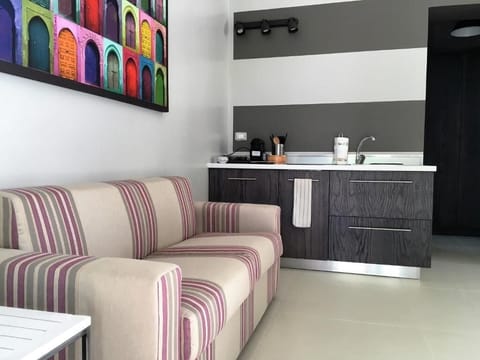 Ada Apartment | Living area | 24-inch LCD TV with digital channels, TV