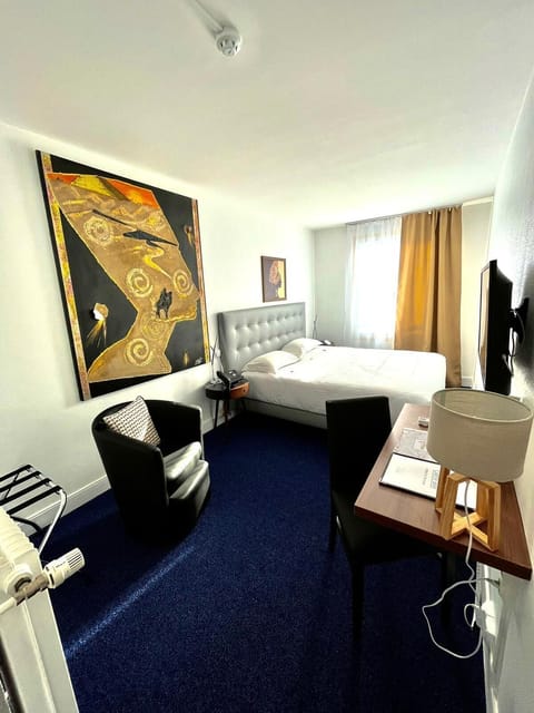 Premium bedding, desk, laptop workspace, iron/ironing board