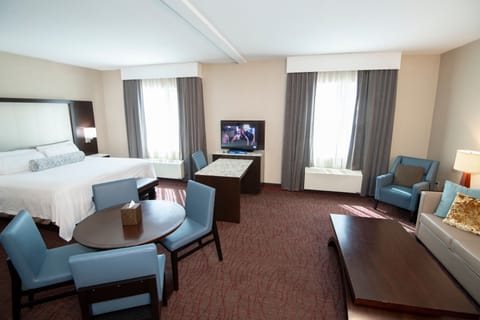 Open Bay Suite | Living area | Flat-screen TV, pay movies
