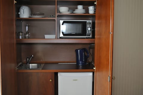 Mini-fridge, microwave, electric kettle, highchair