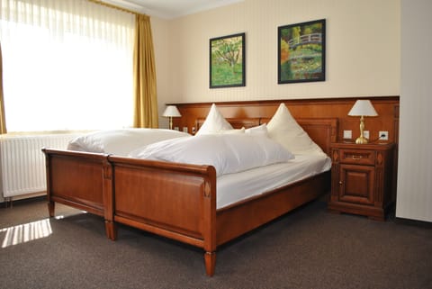 Deluxe Double Room | In-room safe, desk, laptop workspace, blackout drapes