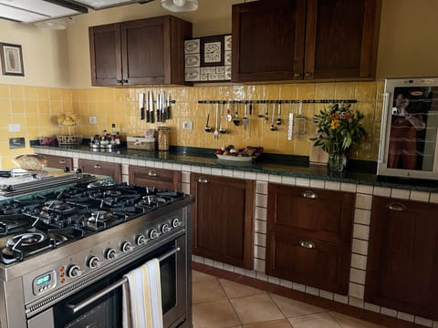Well stocked commercial kitchen with 6 burner stove.
