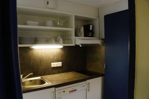 Cook a delicious meal in the kitchen.