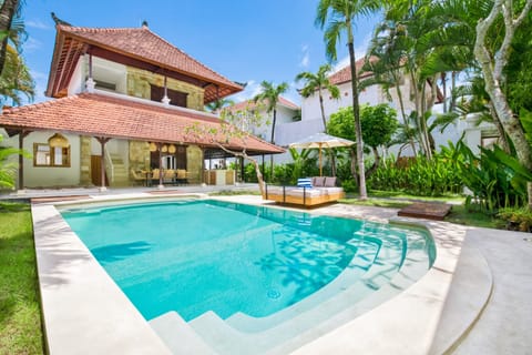 Large pool and tropical garden