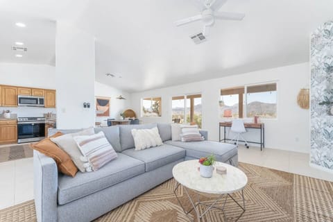 Open-concept main living space w/designer features & queen sleeper sofa