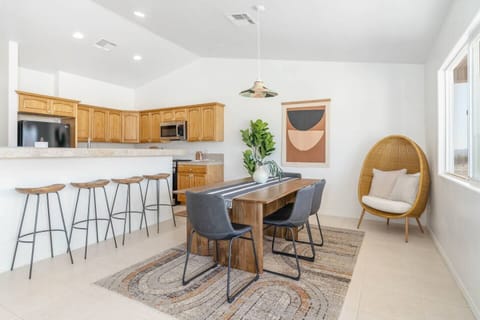 Light, modern-designed dining room & kitchen area
