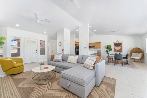 Main living area with ample natural light & cozy seating