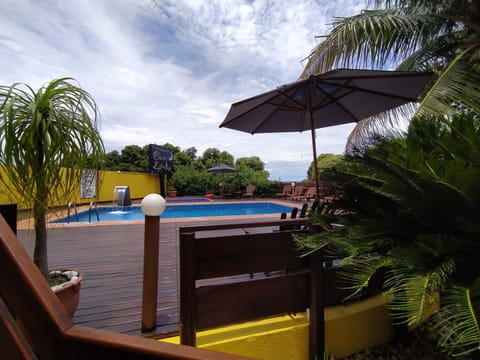 Outdoor pool, open 8:00 AM to 10:00 PM, pool umbrellas, sun loungers