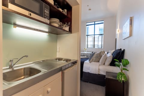 Apartment | Private kitchen | Mini-fridge, microwave, stovetop, coffee/tea maker