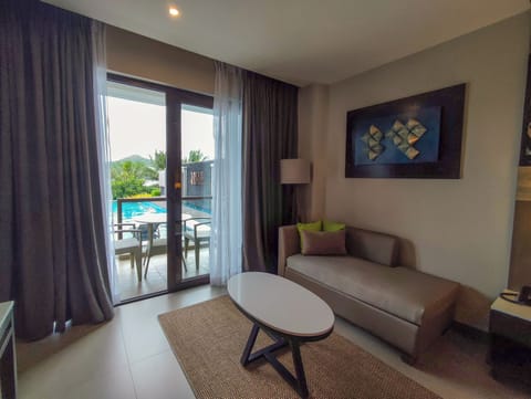 Deluxe Double or Twin Room, Pool View | Living area | 42-inch LED TV with cable channels, TV