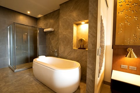 Premier Room | Bathroom | Shower, hair dryer, bathrobes, slippers