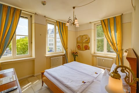 Double Room | Desk, blackout drapes, iron/ironing board, rollaway beds