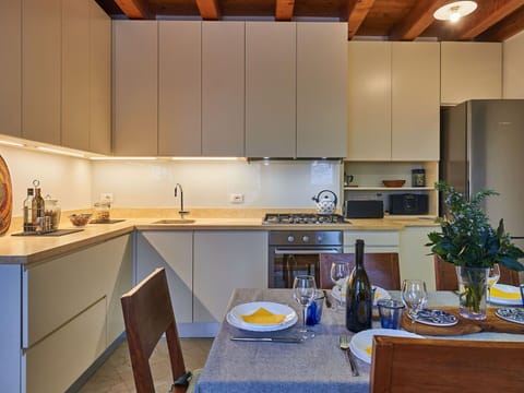 Cabinetry, Property, Furniture, Countertop, Plant, Building, Sink, Kitchen Stove, Table, Kitchen Sink