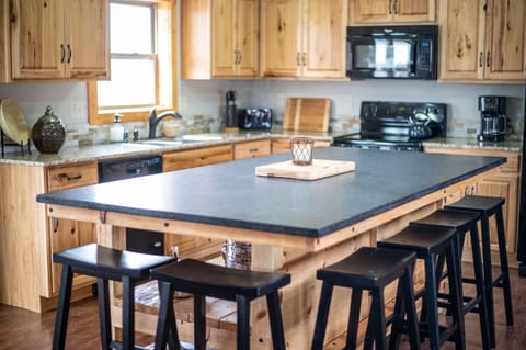 Your friends and family will gather around this 4' x 8' granite bar, the heart and hub of the home. Imagine all the food and fun that will be served at this bar. Come make memories that will last for years to come. Come and get it!