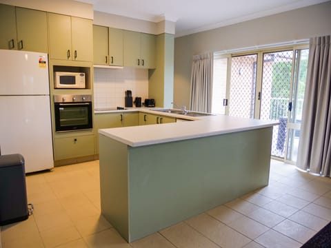 Three Bedroom Apartment | Private kitchen | Fridge, coffee/tea maker, electric kettle