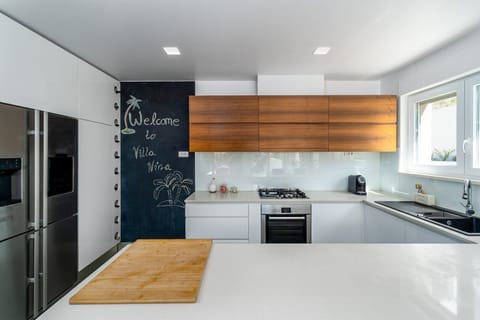 A fully equipped and airconditioned kitchen with all the needed amenities