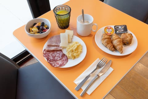 Daily buffet breakfast (EUR 12 per person)