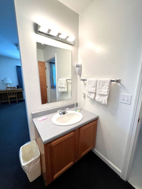 Comfort Double Room, 2 Queen Beds | Bathroom | Combined shower/tub, hair dryer, towels