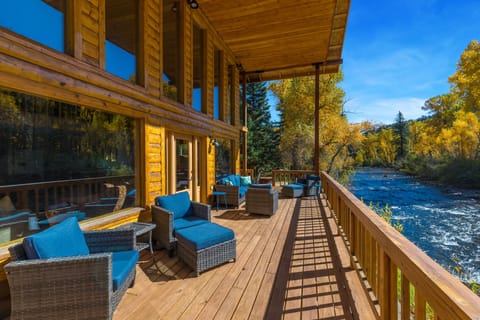 Our riverside deck with outdoor seating.