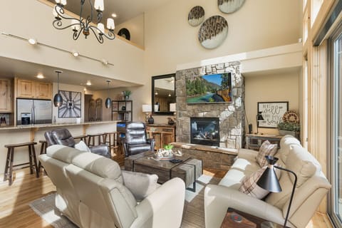 Main Living Space and Kitchen - Gas Fireplace, TV and deck access