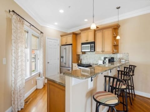 Townhome, 2 Bedrooms | Private kitchen | Fridge, oven, stovetop, coffee/tea maker