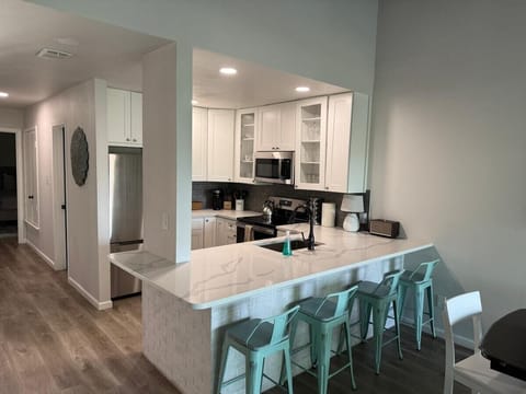 Kitchen with bar island