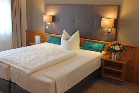 Premium bedding, minibar, desk, soundproofing