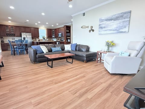 Relax in the living room for family movie night with plenty of seating for all.