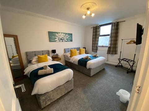 Perfect for unwinding, with comfortable beds and a peaceful vibe to make you feel right at home. A perfect space for a restful night and rejuvenating stay.