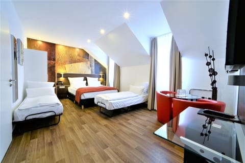 Triple Room | Premium bedding, free minibar, in-room safe, desk