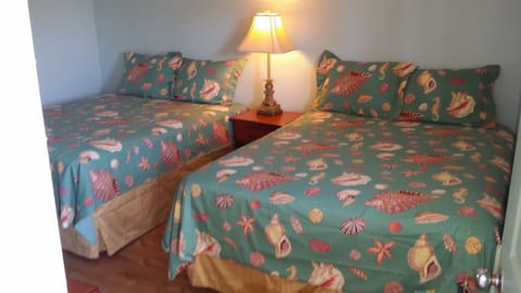 Room, 2 Queen Beds | Individually decorated, individually furnished, free WiFi, bed sheets