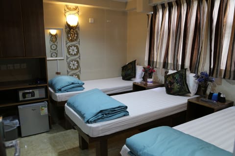 Triple Bed Room (Double &Single Bed) | In-room safe, free WiFi, bed sheets, wheelchair access