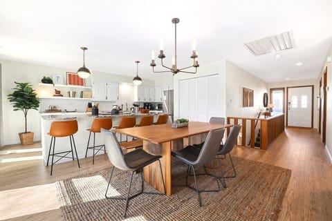 Directly to the right, you'll see our fully stocked kitchen with everything you need to whip up your favorite meal or baked goods.