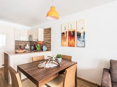 Table, Furniture, Property, Wood, Cabinetry, Interior Design, Floor, Flooring, Living Room, Real Estate