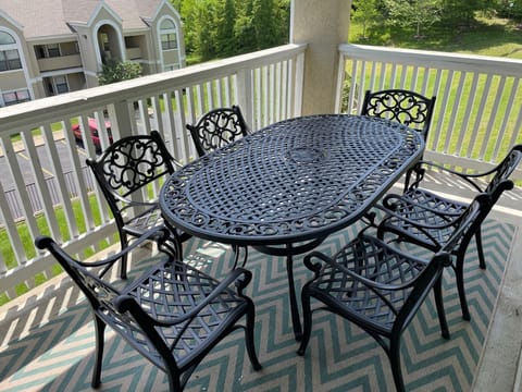 Covered porch with patio furniture w/access from living room and master bedroom.