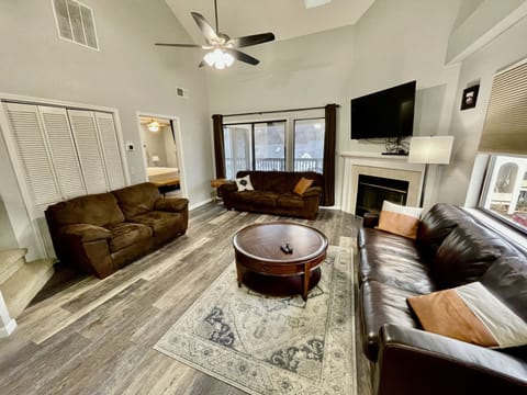 Family room with sleeper sofa and 55" smart TV