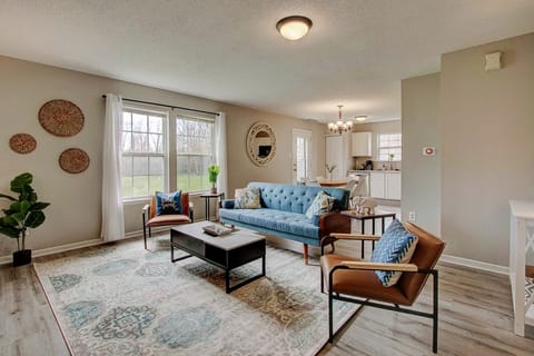 The couch has been updated from the one in this picture to a plush velvet couch.