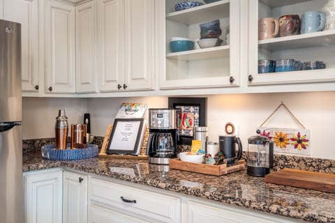 Coffee & Tea Bar. Regular & Decaf. Cappuccino milk frothier.