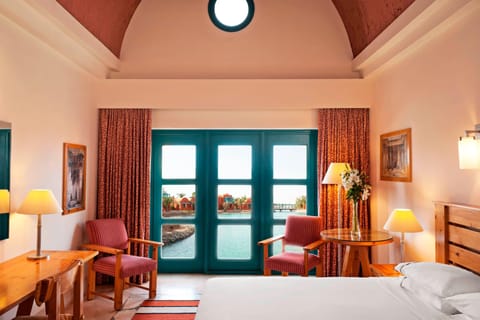 Classic Room, 1 King Bed, Balcony, Lagoon View | In-room safe, desk, laptop workspace, blackout drapes