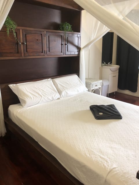 Standard Room, 1 Queen Bed, Shared Bathroom | Free WiFi