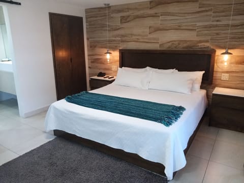 Junior Suite, 1 Queen Bed | Blackout drapes, iron/ironing board, free WiFi, bed sheets