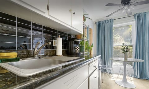 Dishes, pots, pans, and enough cooking supplies to make a yummy meal.