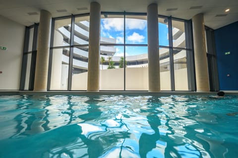 Indoor pool, seasonal outdoor pool, sun loungers